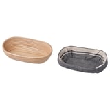 Two round woven baskets, one natural rattan, the other with a gray cloth liner.