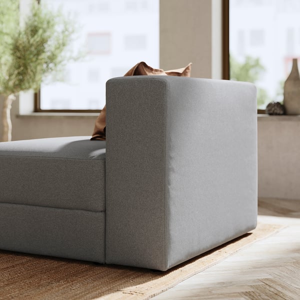 Modern grey JÄTTEBO sofa, sleek design, soft fabric, clean lines, perfect for relaxation.