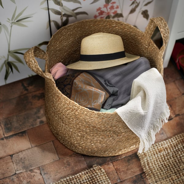 KÄLKEN jute storage basket, large size, holding hat & towels, natural colour, woven design, floor placement.