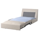 KIVIK compact beige sofa-bed with blue cushions, sleek modern design.