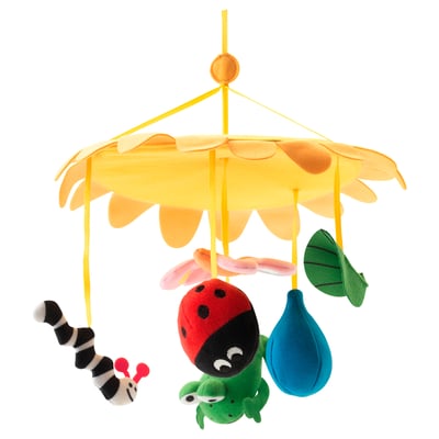 KLAPPA colorful baby mobile, featuring red ladybug, green caterpillar, and blue leaf. Bright yellow daisy backdrop. Soft fabric materials.