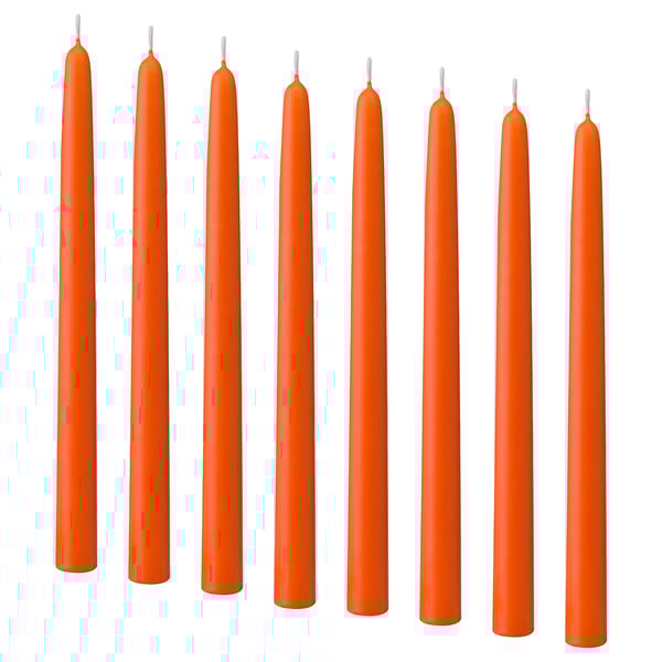 Eight tall orange candles in a line. Stearin material, unlit with cotton wicks.
