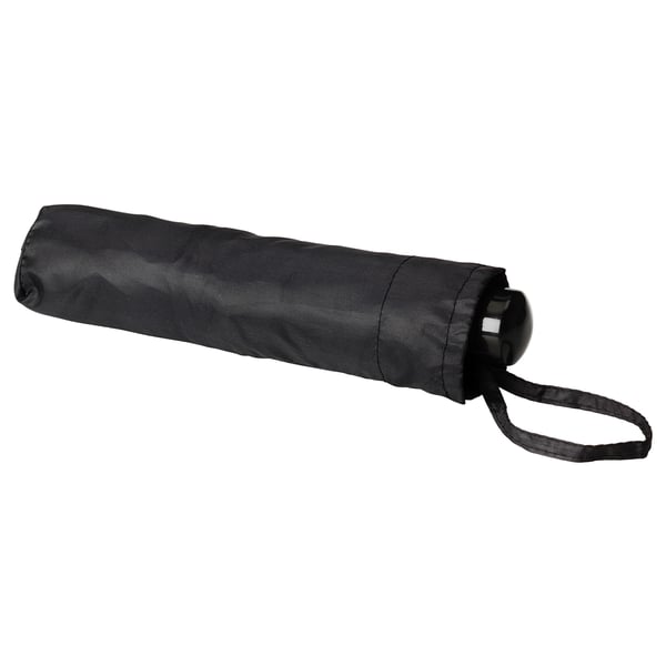 Foldable black umbrella with wrist strap, compact for easy carrying in bags.