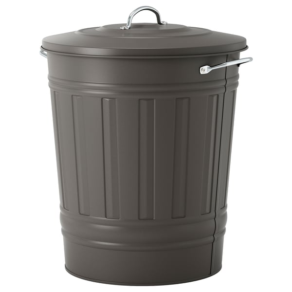 A KNODD grey metal bin with vertical grooves. It has a lid with a handle and a hook for hanging.