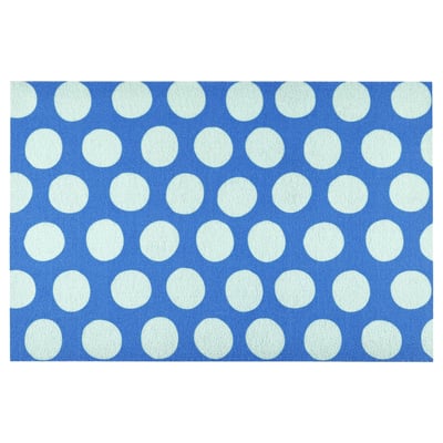 Bright blue rectangular doormat with white polka dots.