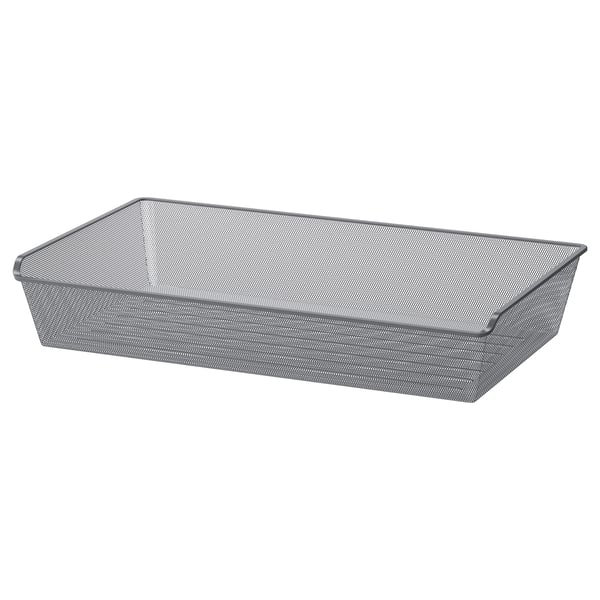 A KOMPLEMENT grey mesh storage basket, rectangular, made of steel with a powder coat finish. Its designed for organizing clothes and accessories.