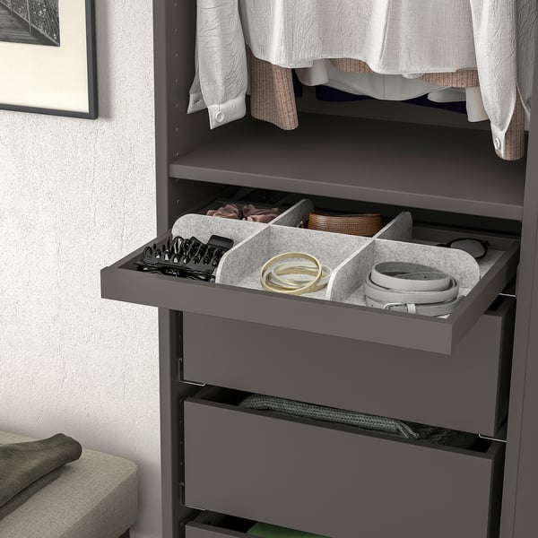 Open wardrobe organizer with felt dividers for jewelry, accessories, and small items.