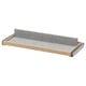 An ikea KOMPLEMENT pull-out tray in beige with grey felt lining. It a sleek design with a metal frame for mounting.