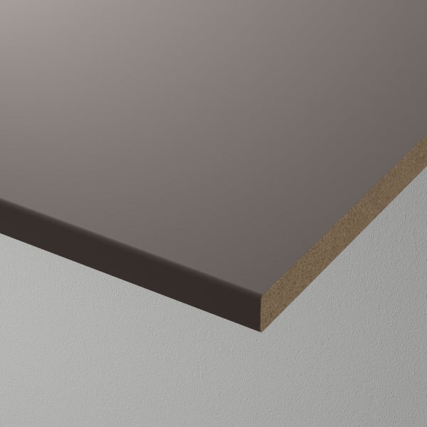 Depicts a close-up view of a shelf edge, showcasing its smooth, semi-matte surface and quality construction.