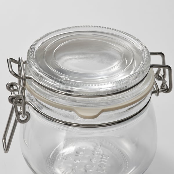Clear glass jar with secure metal clasp lid, sealed rubber ring ensuring airtight closure.