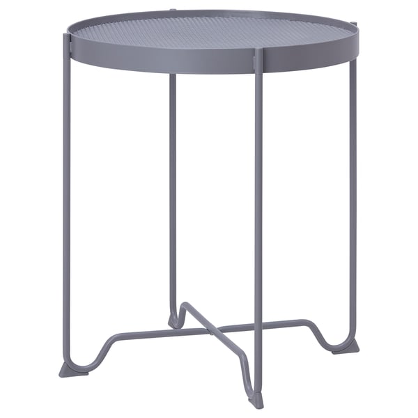 Round, gray KROKHOLMEN metal side table with mesh top and sturdy, wavy legs.