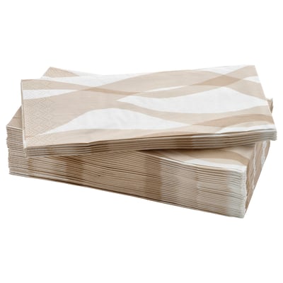 Stack of beige and white patterned, three-ply paper napkins, neatly arranged in a pile.