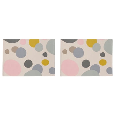 Two rectangular place mats with multicolored abstract circles.