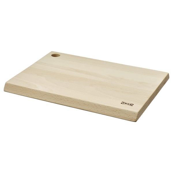Brown beech wood cutting board with hanging hole and IKEA logo.