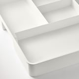 Clear white organizer with multiple compartments, pristine quality.