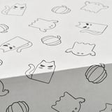 Black and white illustration of cat silhouettes and haunted house designs on a white background, showcasing intricate details and playful themes.