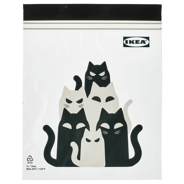 An ikea KUSTFYR white resealable bag with black and white cat designs.