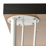 Under table attachment. Circular holder secures four legs, fastened with chrome screws. Top: black, legs: white.