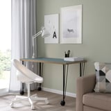 Ground-floor workspace: LAGKAPTEN desk, blue, modern, chair, lamp, art, window.