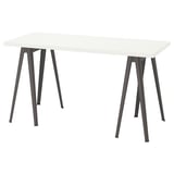 LAGKAPTEN: modern white desk with angular black legs, minimalist design.