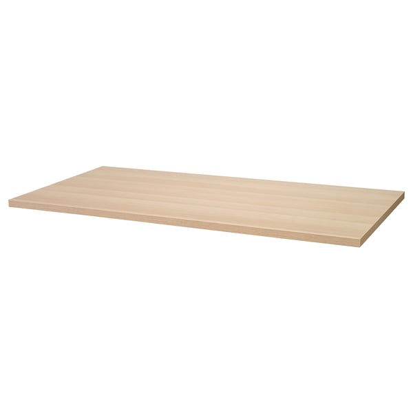 An IKEA LAGKAPTEN table top in light oak colour, rectangular shape, made from fiberboard with a honeycomb paper filling, and acrylic painted surface.