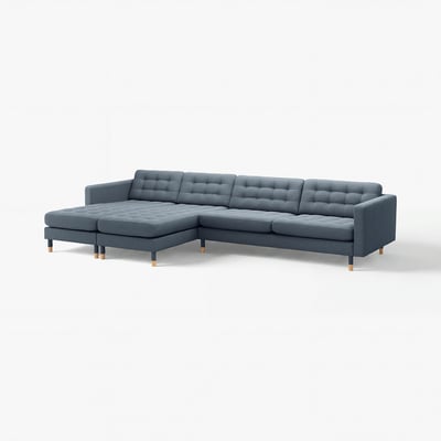 Modern grey sectional sofa with mid-century design, featuring tufted cushions, wooden legs, and a corner chaise.
