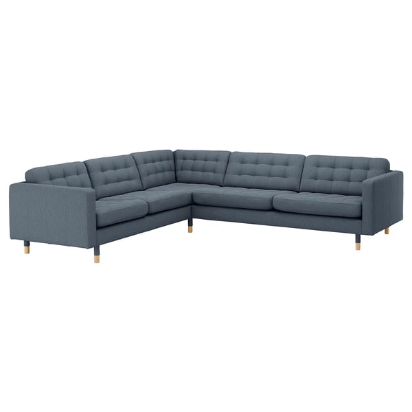 Blue l-shaped LANDSKRONA couch with wooden legs, designed for comfort and style.
