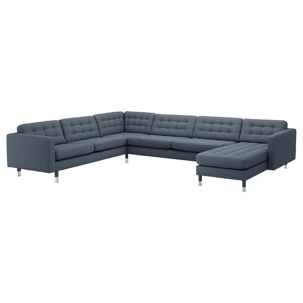 Large grey sectional sofa with tufted back, metal legs, l-shape.