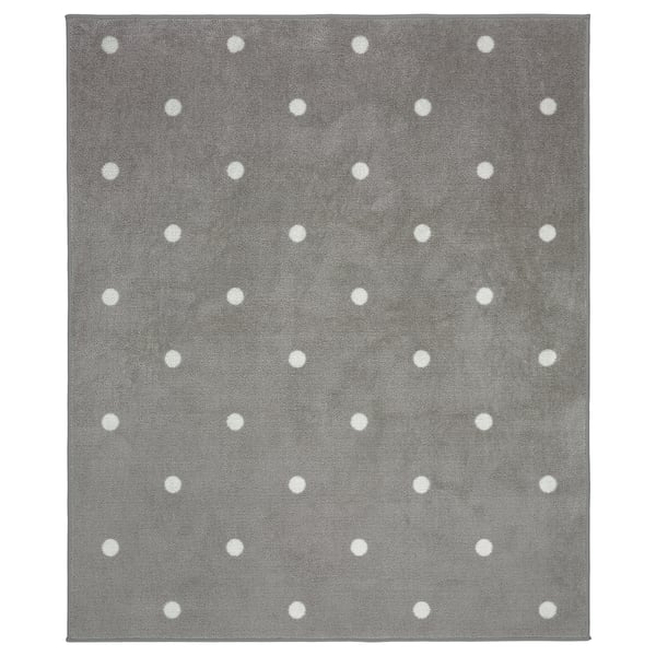 Grey rug with white dots, square shaped, soft nylon surface with rubber backing.