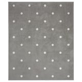 Grey rug with white dots, square shaped, soft nylon surface with rubber backing.