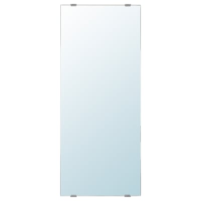A LETTAN mirror. Its rectangular, colorless, with a modern design. Made of glass and plastic foil, it can be hung vertically or horizontally.