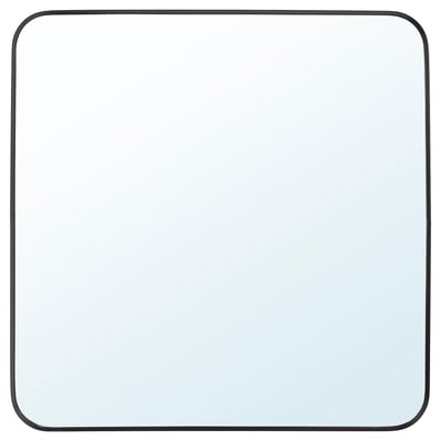 A LINDBYN mirror with a black frame, rectangular shape, and rounded edges. Its made of aluminum and glass, ideal for bathroom walls.