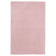 Light pink, rectangular, plush area rug, soft and cozy, made from recycled polyester.