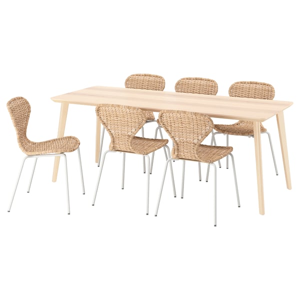 Natural-colored LISABO dining set with light wood table and woven chairs, providing a warm, natural feel.