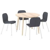 A modern round dining set with a light wood table and four upholstered blue chairs.