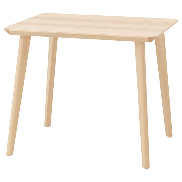 LISABO: light wood dining table with tapered legs.
