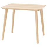 LISABO: light wood dining table with tapered legs.