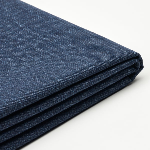 Folded dark blue fabric, smooth texture, neatly arranged.