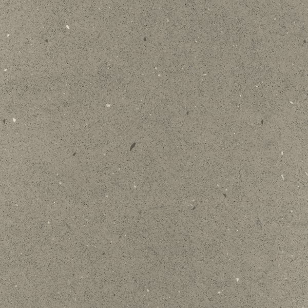 Greyscale speckled texture of recycled glass worktop.