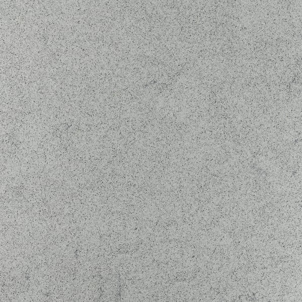 Smooth, reflective surface of recycled glass worktop.