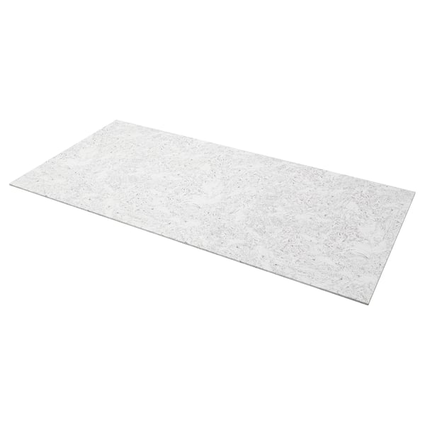 A rectangular, white LOCKEBO worktop made from recycled glass. Its smooth, stain-resistant surface adds a natural, expressive look.