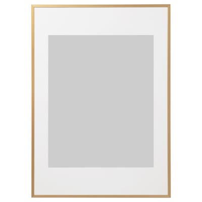 Gold-colored, rectangular picture frame with white mat.