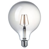 The ikea LUNNOM bulb a warm, 2200k glow with a spiral filament inside smoke-colored glass, creating a cozy ambiance.