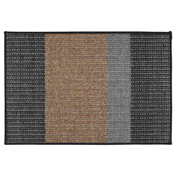 A rectangular LYNDERUP door mat with black, yellow, and gray woven stripes and a textured surface.