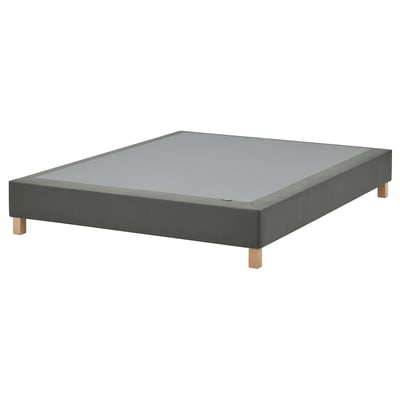 A grey fabric-covered LYNGÖR mattress base with wooden legs, offering support and elevating the bed.