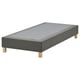 Grey upholstered bed base with wooden legs.