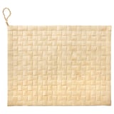 Natural beige woven palm place mat with loop handle, handcrafted for rustic charm.