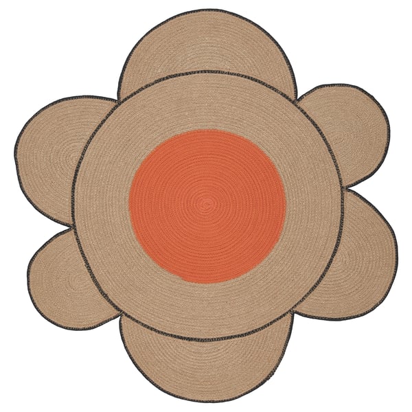 MÄVINN rug, brown jute & orange cotton, flower shape with braided petals and circular center.