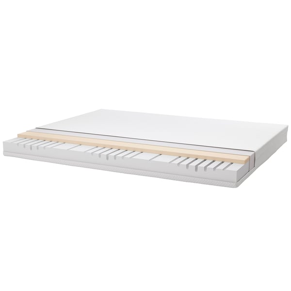 Cross-section of a mattress: foam layers, wood support, mesh top.