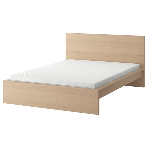 Light oak MALM bed in minimalist design with white mattress.